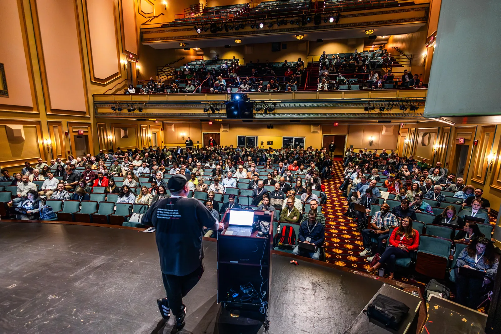 The view from the stage across a packed Carolina Theatre at All Things Open AI 2025